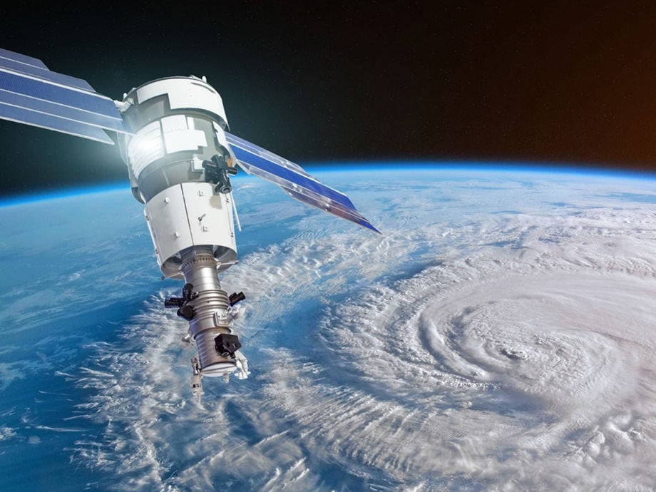 image of earth in space with a satalite