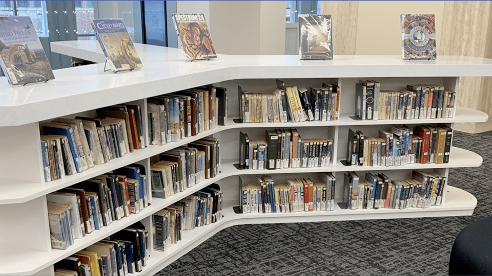 bookshelf of science fiction books