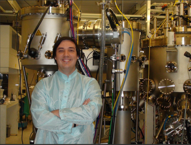 Carver stands in front of JPL’s brand new MBE device, 2009.